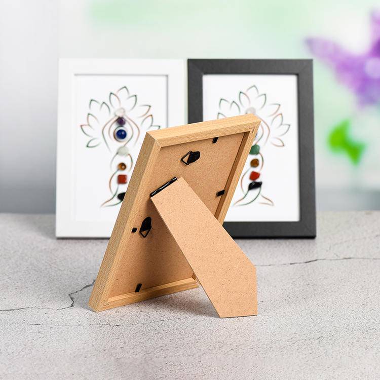 Seven chakras tree-like crystal stone picture frame on the table